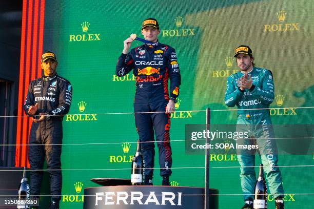 Max Verstappen of the Netherlands and Oracle Red Bull Racing, Lewis Hamilton of Great Britain and Mercedes-AMG PETRONAS Formula One Team and Fernando...