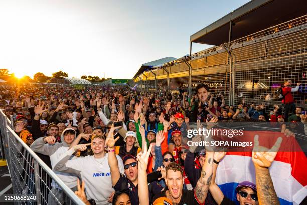 Fans celebrating on the track following the Formula One Australian Grand Prix at the Albert Park Circuit in Melbourne.