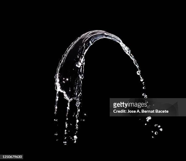 figures and abstract forms of water on a black background. - fountain stock pictures, royalty-free photos & images