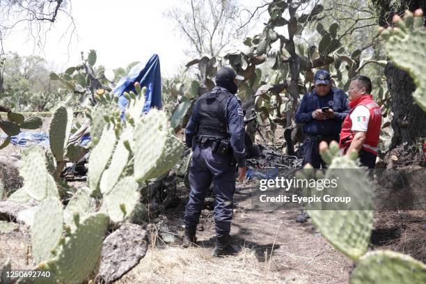 April 1 State of Mexico, Mexico: National Guard and Experts investigate the crash area, where a hot air balloon caught fire in mid-flight in the...