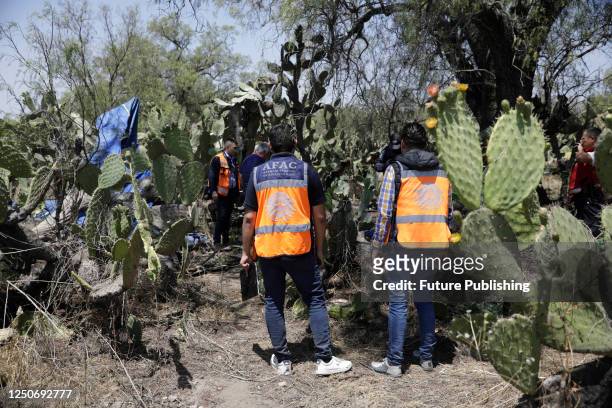 April 1 State of Mexico, Mexico: National Guard and Experts investigate the crash area, where a hot air balloon caught fire in mid-flight in the...
