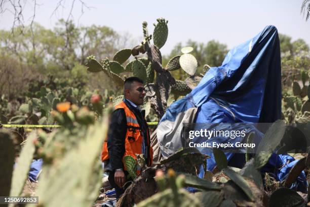 April 1 State of Mexico, Mexico: National Guard and Experts investigate the crash area, where a hot air balloon caught fire in mid-flight in the...