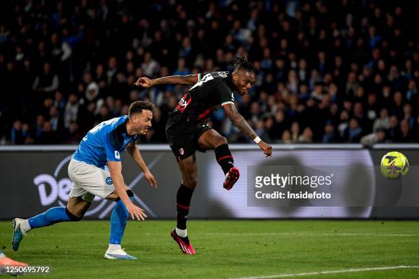 Rafael Leao of AC Milan , challenged by Amir Rrahmani of SSC Napoli, scores the goal of 0-3 during the Serie A football match between SSC Napoli and...