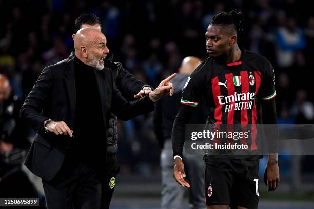 Stefano Pioli head coach of AC Milan talks with Rafael Leao during the Serie A football match between SSC Napoli and AC Milan. Milan won 4-0 over...