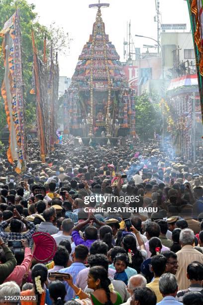 Hindu devotees throng the chariot festival of Kapaleeswarar temple in Chennai on April 3, 2023.