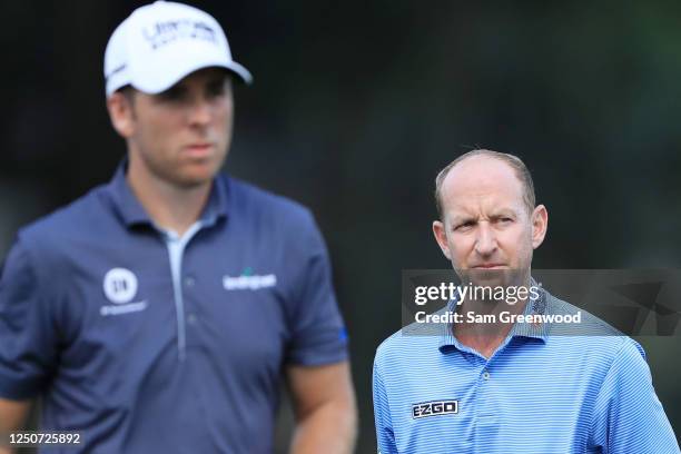 Luke List of the United States and Vaughn Taylor of the United States walk on the ninth hole during the second round of the RBC Heritage on June 19,...