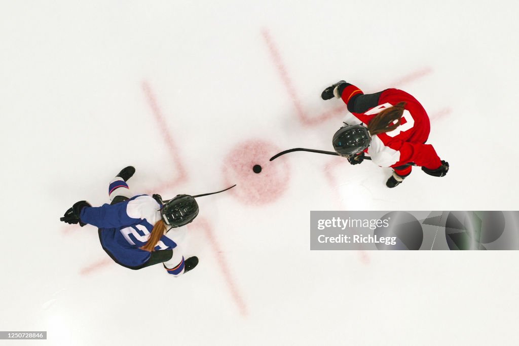 Woman Ice Hockey Team on the Ice