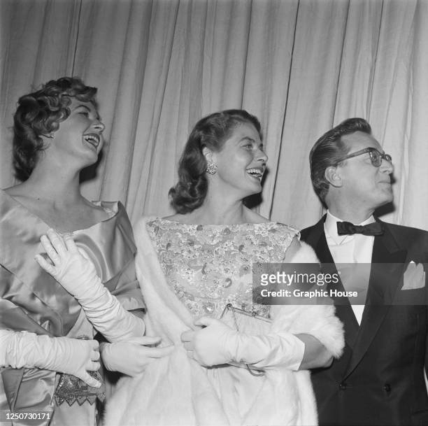 Swedish actress Ingrid Bergman with her daughter Pia Lindstrom and her husband Lars Schmidt at the 31st Academy Awards in Hollywood, California, 6th...