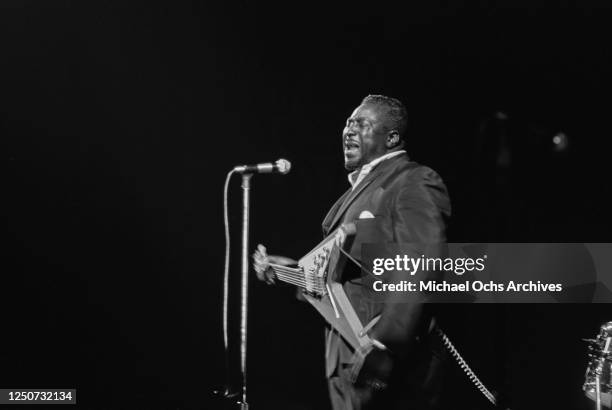 American blues guitarist and singer Albert King in concert with his Gibson Flying V at the Village Gate in Greenwich Village, New York City, 11th...