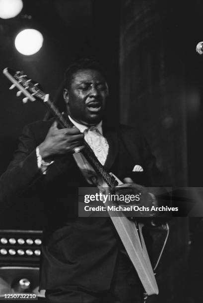 American blues guitarist and singer Albert King in concert with his Gibson Flying V at the Village Gate in Greenwich Village, New York City, 11th...