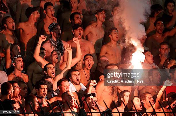 Fans show their support during the UEFA Europa League group A match between PAOK FC and Tottenham Hotspur at Toumpa Stadium on September 15, 2011 in...