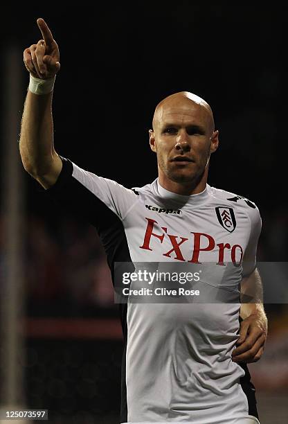 Andy Johnson of Fulham celebrates as he scorea their first goal during the UEFA Europa League Group K match between Fulham and FC Twente at Craven...