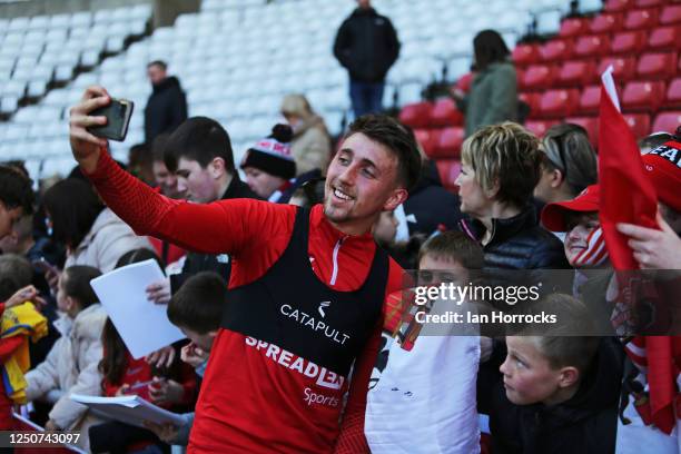 Dan Neil meets fans during a Sunderland open training session at Stadium of Light on April 3, 2023 in Sunderland, England.