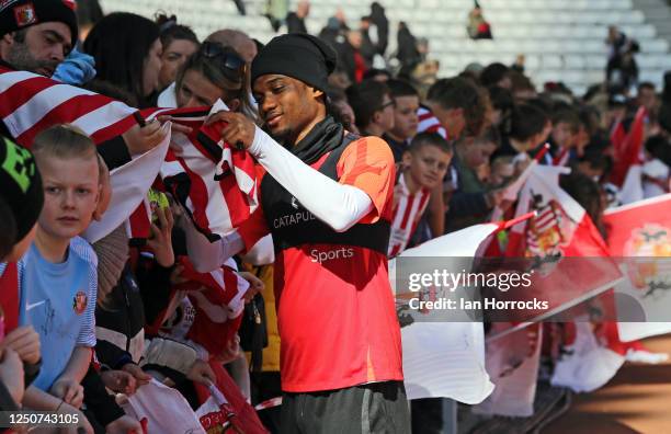 Amad Diallo meets fans during a Sunderland open training session at Stadium of Light on April 3, 2023 in Sunderland, England.
