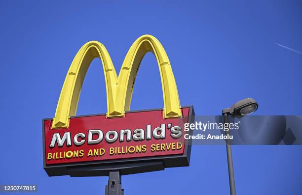 Logo of the American fast food company McDonald's is seen outside one of the stores in Washington, United States on April 03, 2023. McDonaldâs...
