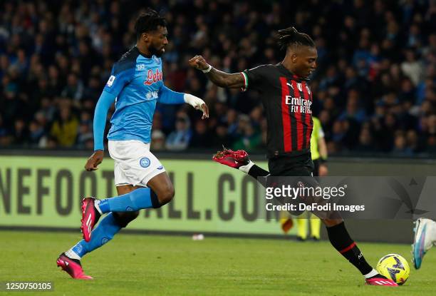 Rafael Leao of AC Milan, Andre Zambo Anguissa of SSC Napoli battle for the ball during the Serie A match between SSC Napoli and AC Milan at Stadio...