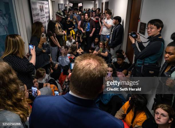 Republican Representative William Lamberth speaks with students inside Cordell Hall in Nashville after students walked out of schools to gather at...