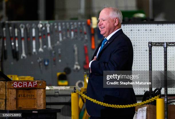 Minnesota Governor Tim Walz arrives during a visit by U.S. President Joe Biden to the Cummins Power Generation facility on April 3, 2023 in Fridley,...