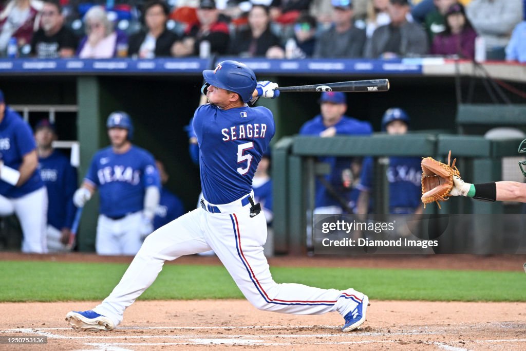 Corey Ranger Corey Seager of the Texas Rangers hits a single during the first ...