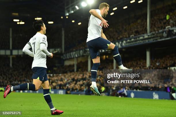 Tottenham Hotspur's English striker Harry Kane celebrates after scoring his team first goal during the English Premier League football match between...