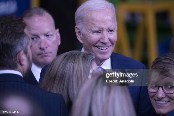 President Joe Biden talks to people that came out to see him speak at the Cummins power generation facility, on April 03, 2023 in Fridley, Minnesota,...