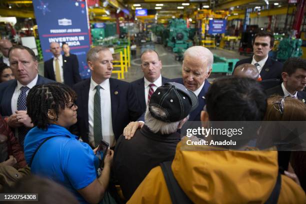 President Joe Biden talks to people that came out to see him speak at the Cummins power generation facility, on April 03, 2023 in Fridley, Minnesota,...