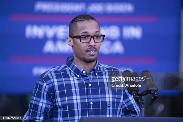 Brandon Moore, an employee at Cummins, Inc. Speaks to the crowd that showed up to listen to President Biden speak, on April 03, 2023 in Fridley,...
