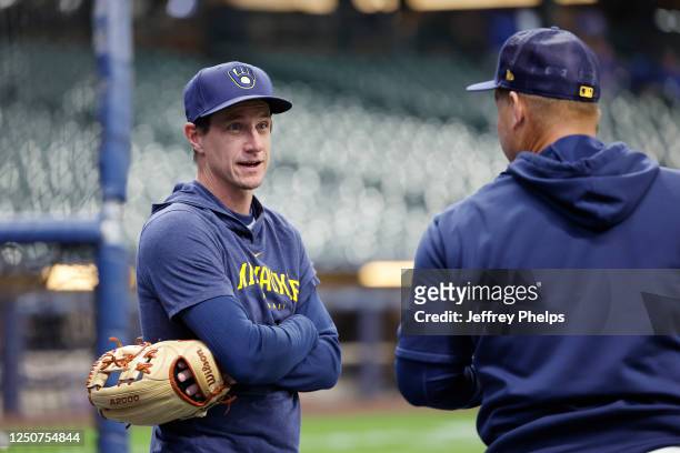 Manager Craig Counsell of the Milwaukee Brewers watches warmups prior to the game between the New York Mets and the Milwaukee Brewers at American...