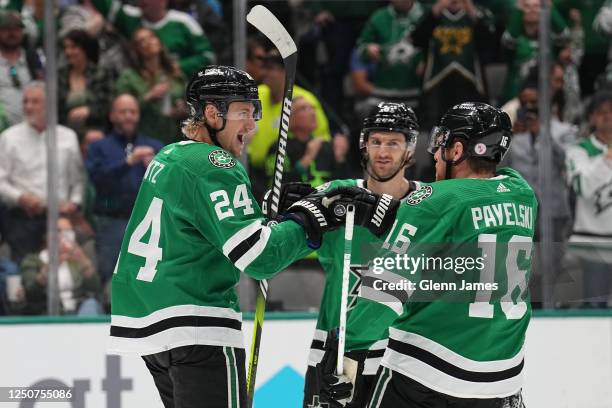 Roope Hintz, Colin Miller and Joe Pavelski of the Dallas Stars celebrates a goal against the Nashville Predators at the American Airlines Center on...