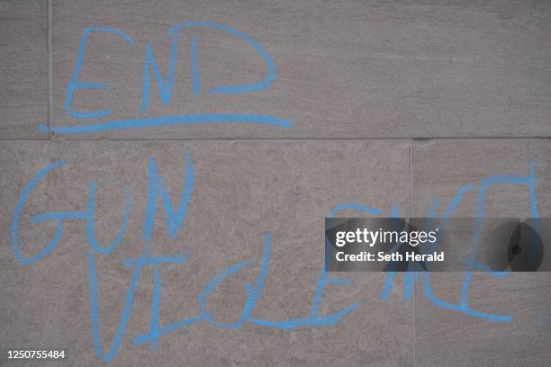 End Gun Violence" is written in chalk on the Tennessee State Capitol building during a protest to demand action for gun reform laws in the state on...