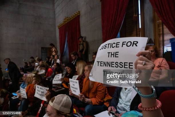 Protesters listen during a house session from the gallery at the Tennessee State Capitol during a protest to demand action for gun reform laws in the...