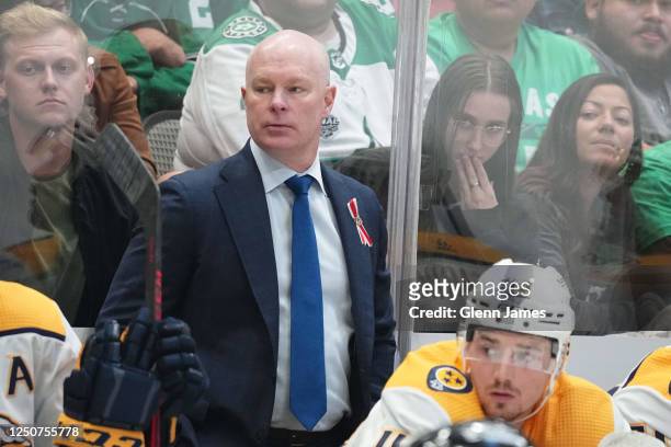 John Hynes of the Nashville Predators coaches against the Dallas Stars at the American Airlines Center on April 3, 2023 in Dallas, Texas.