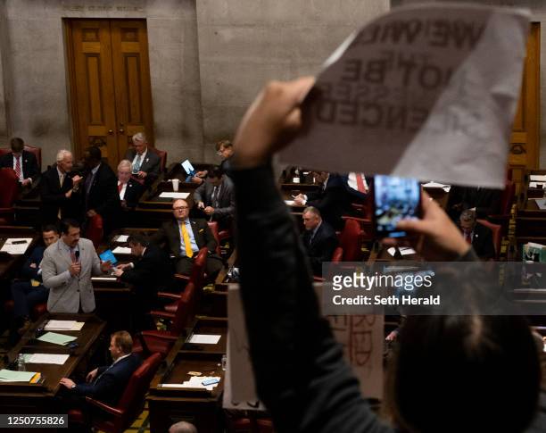Protesters listen during a house session from the gallery at the Tennessee State Capitol during a protest to demand action for gun reform laws in the...