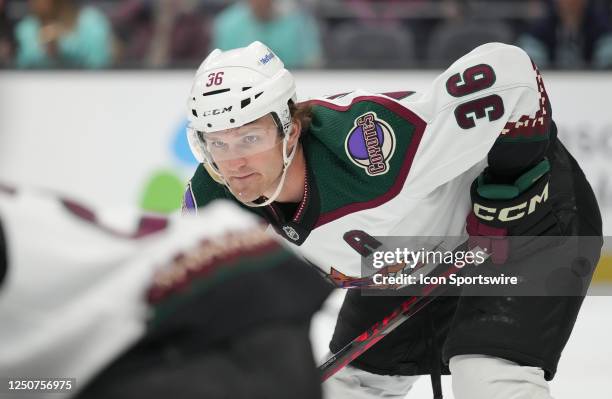 Arizona Coyotes right wing Christian Fischer looks on during a face-off during an NHL game between the Seattle Kraken and the Arizona Coyotes on...