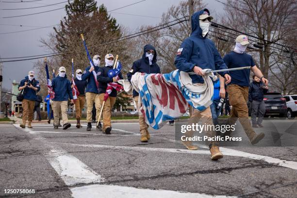 The white supremacist group Patriot Front march in formation, leaving Element 41, a restaurant holding an 18-and-over drag brunch to raise money for...