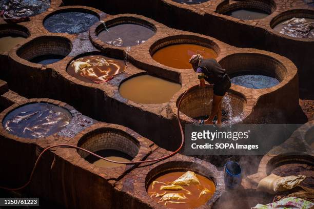 Worker seen cleaning himself in Chouara Tannery, one of the biggest tanneries within the medina of Fes . The tanneries in Fes , have been run as a...