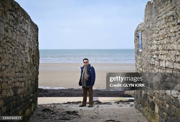 Councillor Michael Lilley, Mayor of Ryde, poses for pictures on March 30, 2023 by Ryde beach on the Isle of Wight which has suffered from sewage...