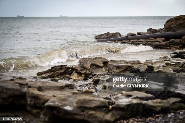 Photograph taken on March 30, 2023 shows a CSO pipe on Ryde beach on the Isle of Wight which has suffered from sewage pollution in recent years...