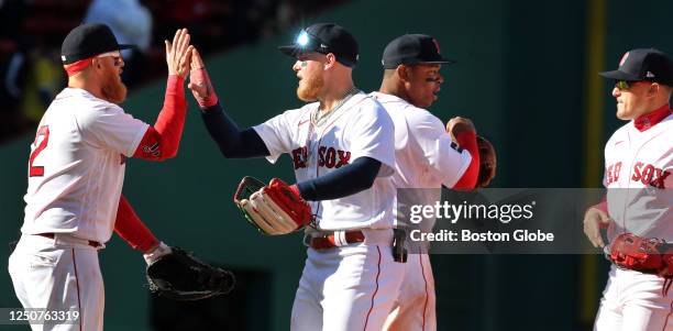 From left to right, Boston Red Sox 1B Justin Turner, RF Alex Verdugo, 3B Rafael Devers and SS Kike Hernandez celebrate the win. The Red Sox defeated...