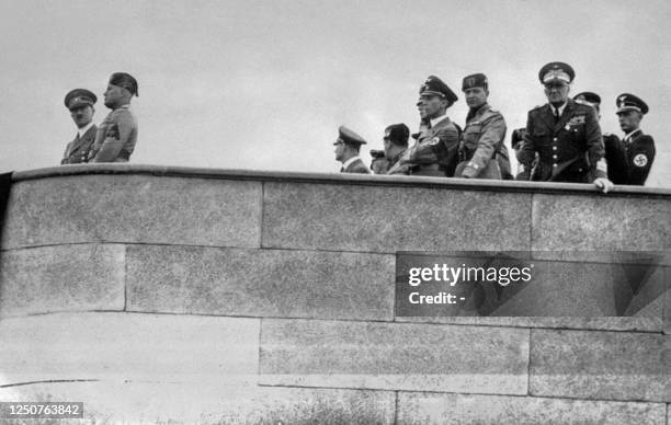 Italian Prime minister Benito Mussolini and Third Reich Chancellor Adolf Hitler give a speech at a rally in Roma during Hitler's five-day visit to...