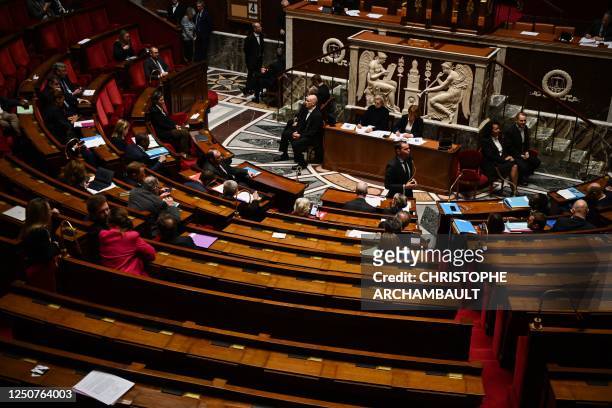 French Labour Minister Olivier Dussopt speaks during a session of questions to the government at The National Assembly in Paris on April 4, 2023.
