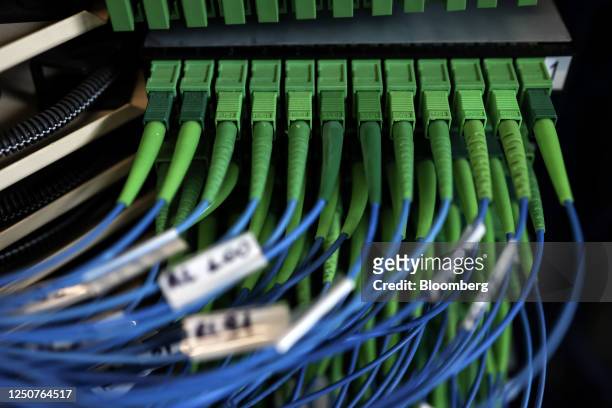 Fiber optic cables in an optical line termination in a Telecom Italia SpA telephone exchange in Rome, Italy, on Tuesday, April 4, 2023. Telecom...