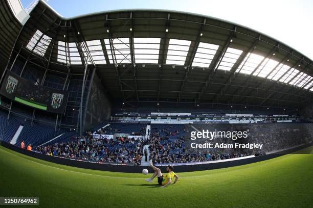 Free style footballer Stephen Gray entertains the crowds during an open training session at The Hawthorns on April 4, 2023 in West Bromwich, England.