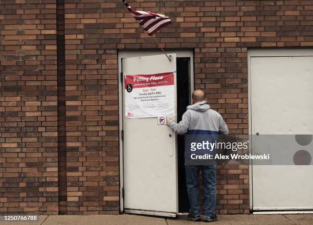 Voter arrives to cast their ballot during the mayoral runoff election at Robert Healy Elementary School on April 4, 2023 in Chicago, Illinois....