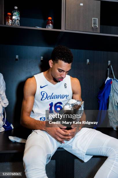 Charlie Brown Jr. #16 of the Delaware Blue Coats poses for a photo with the G League Eastern Conference Finals trophy after the 2023 NBA G League...