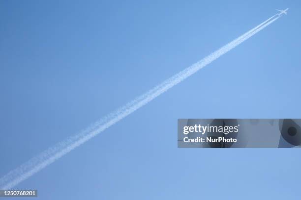 Momcilo An aeroplane leaves a trail in the sky during the Malta BOV Premier League match between Balzan and Hamrun Spartans at the National Stadium,...