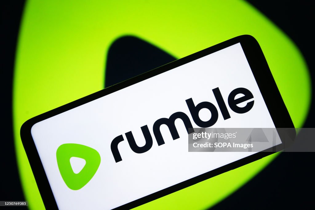 Rumble Sign In In this photo illustration, a Rumble logo is seen on a smartphone ...