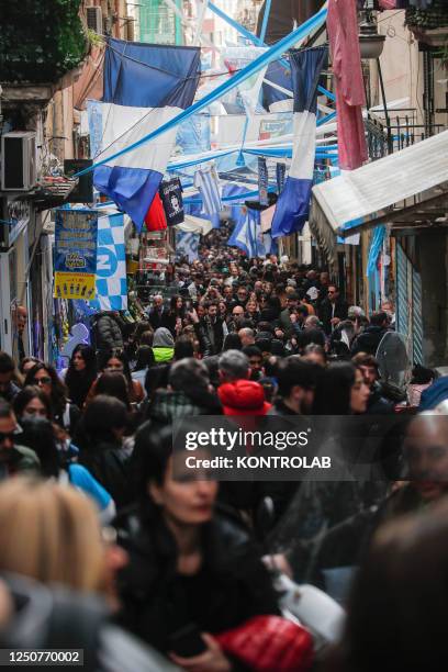 Tourists flock to the Spanish Quarter decorated with ribbons and banners in the colors of SSC Napoli football team. Preparations are in full swing in...