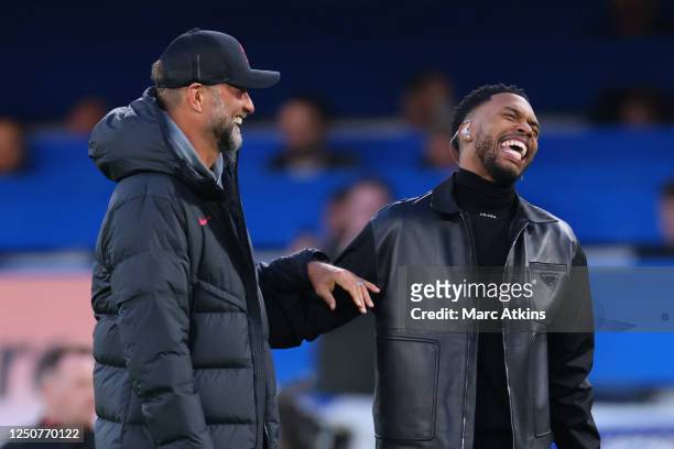 Jurgen Klopp manager of Liverpool with former Liverpool players Daniel Sturridge during the Premier League match between Chelsea FC and Liverpool FC...