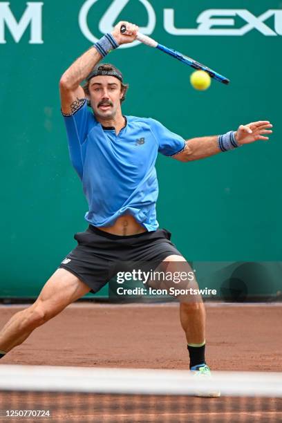 Jordan Thompson hits a return during Round 1 play at the US Clay Court Championship at River Oaks Country Club on April 4 in Houston, Texas.